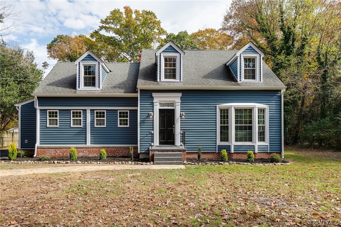 2225 Brookwood Road Richmond, VA 23235 - Photo 2 of 34 front view of a house with a yard