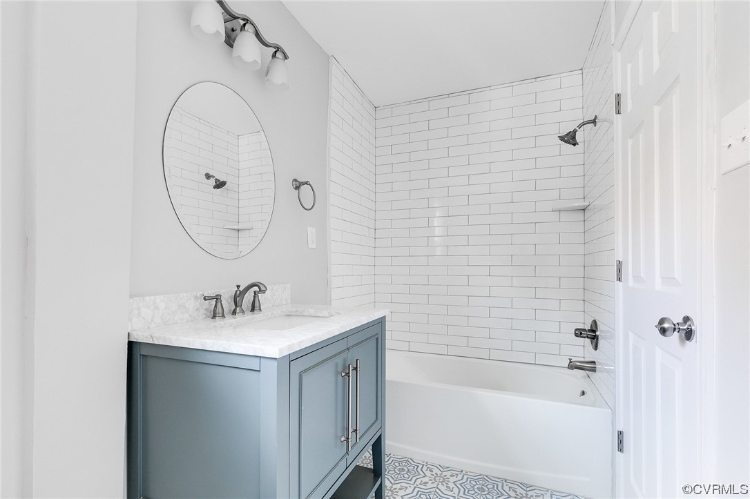 2225 Brookwood Road Richmond, VA 23235 - Photo 27 of 34 a bathroom with a sink and a mirror