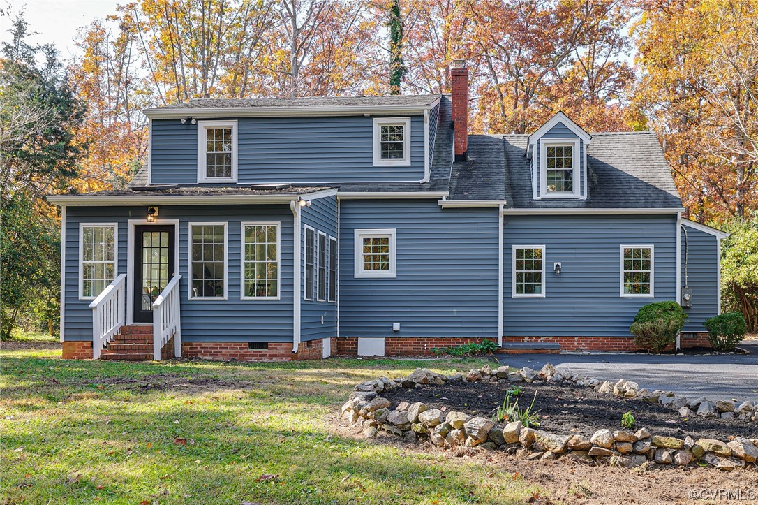 2225 Brookwood Road Richmond, VA 23235 - Photo 32 of 34 a front view of a house with garden