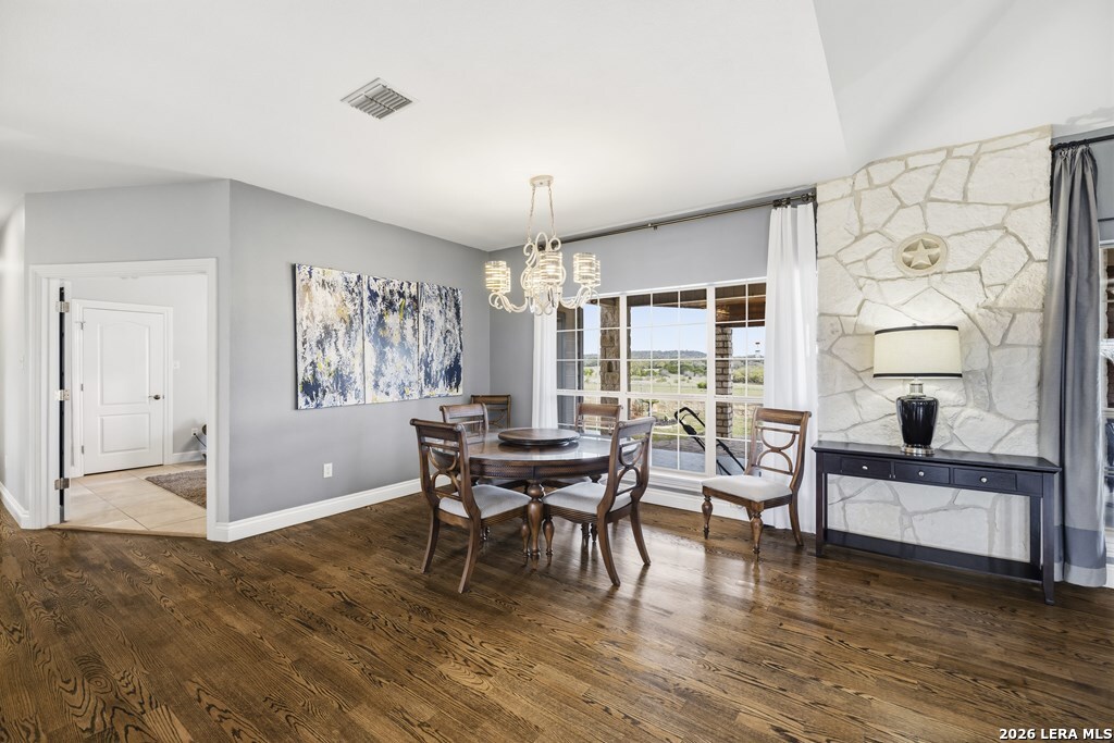 360 Bluff Creek Road North Center Point, TX 78010 - Photo 13 of 64 a living room with furniture and a large window