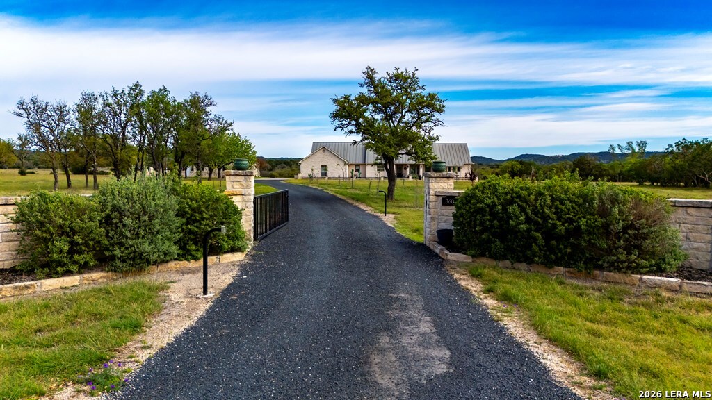 360 Bluff Creek Road North Center Point, TX 78010 - Photo 51 of 64 a view of a pathway with a yard