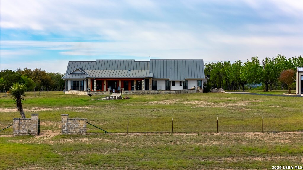 360 Bluff Creek Road North Center Point, TX 78010 - Photo 55 of 64 a view of a swimming pool with a garden and trees