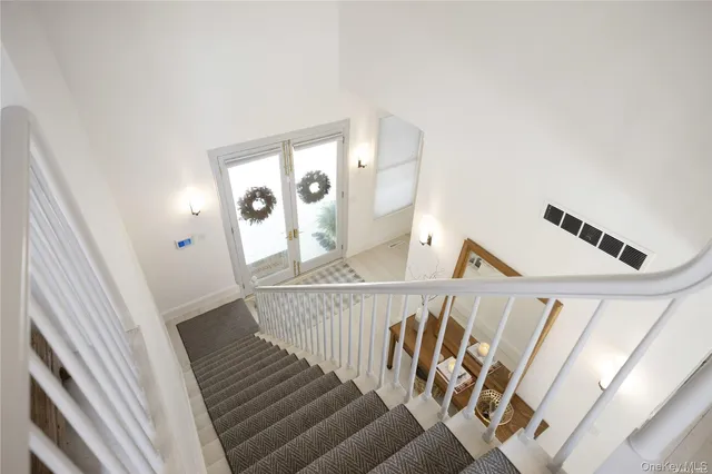 a bedroom with a bed and a fireplace