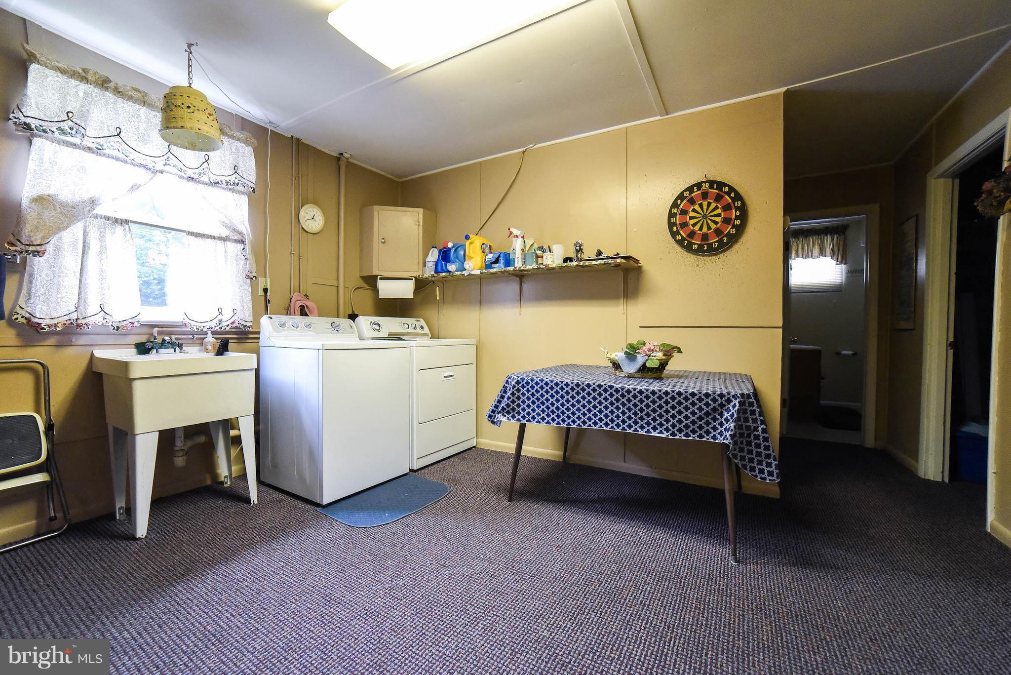 8505 Schultz Road Clinton, MD 20735 - Photo 16 of 18 Large laundry area w/ample storage space