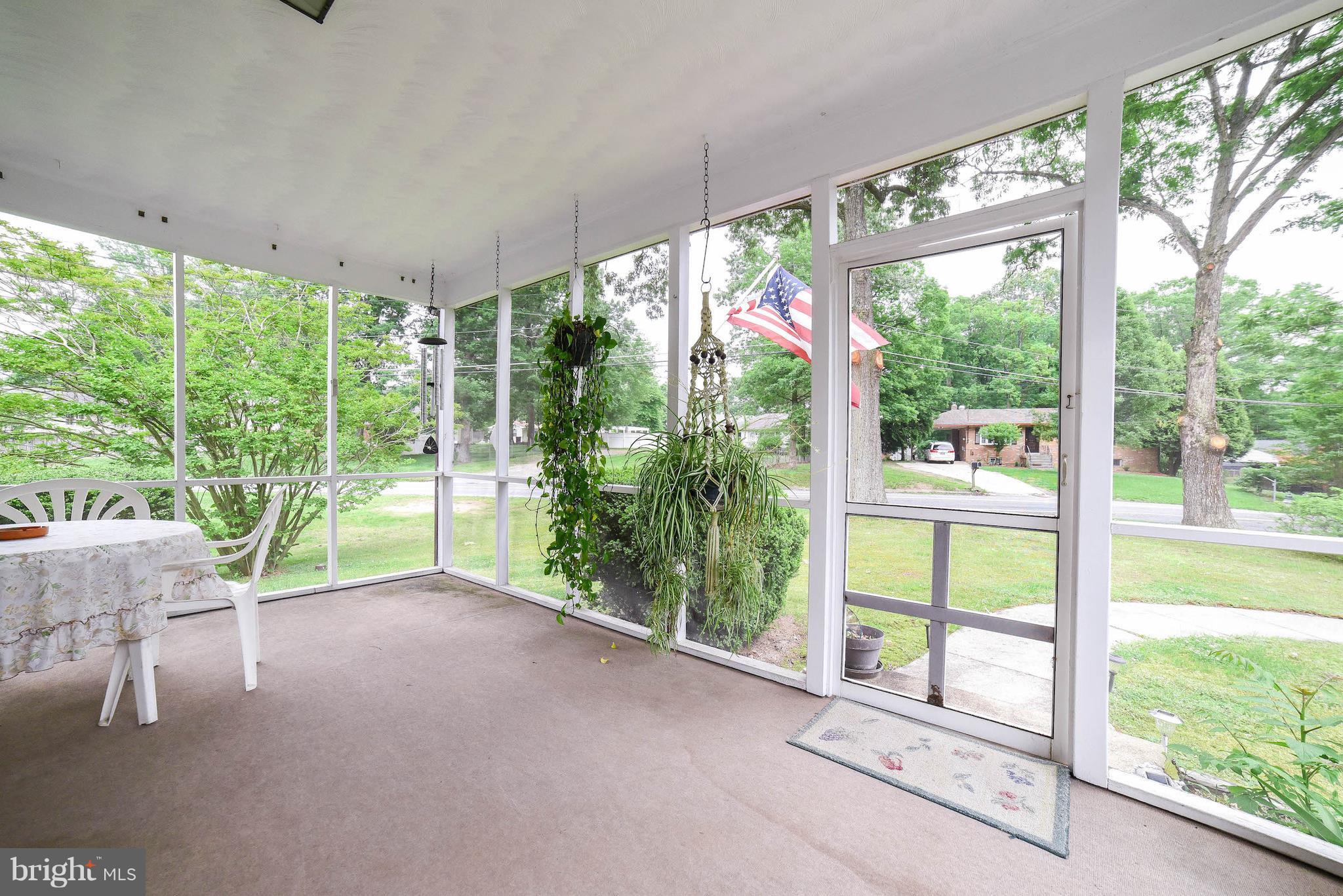 8505 Schultz Road Clinton, MD 20735 - Photo 3 of 18 Enjoy the summer breeze on the front porch