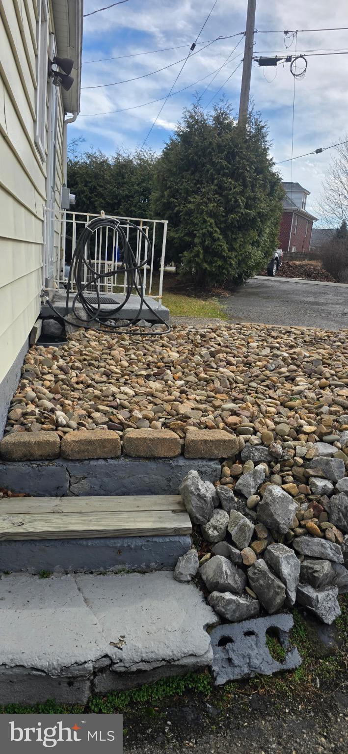 901 Garver Street Roaring Spring, PA 16673 - Photo 17 of 28 Charming stone pathway leads to a cozy home.
