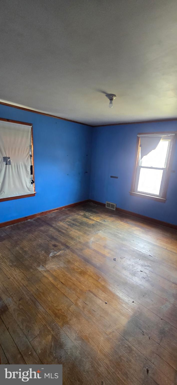 901 Garver Street Roaring Spring, PA 16673 - Photo 19 of 28 Bright blue walls in a spacious room.