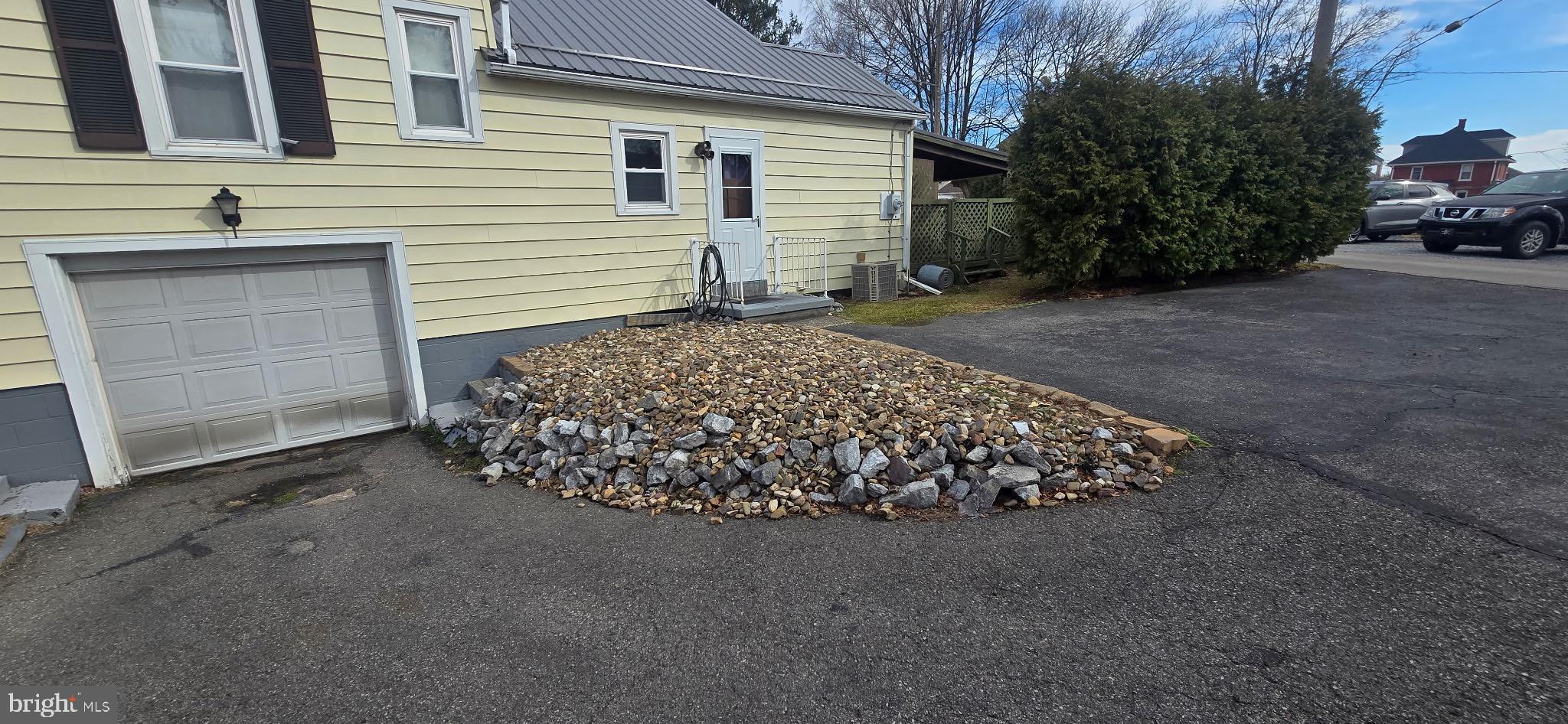 901 Garver Street Roaring Spring, PA 16673 - Photo 2 of 28 Charming home with unique stone landscaping.