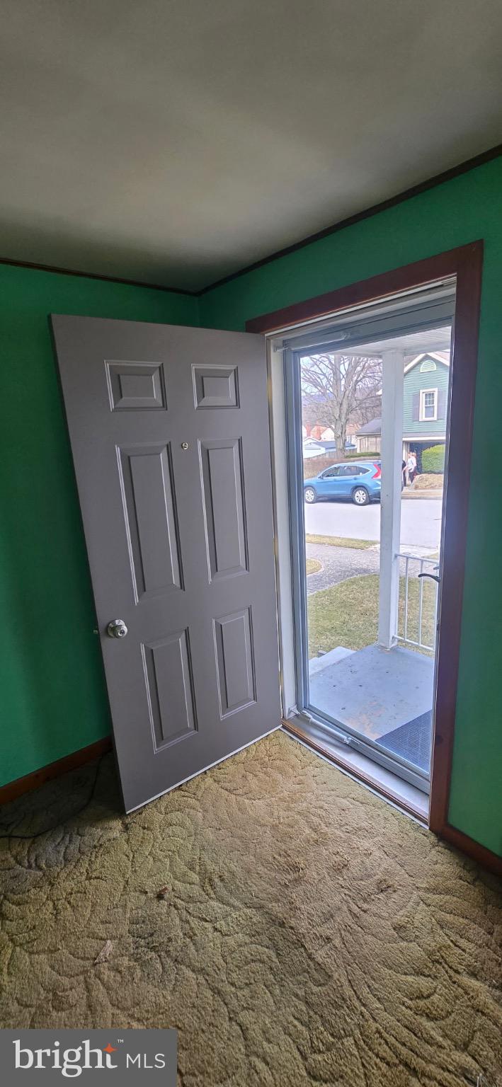 901 Garver Street Roaring Spring, PA 16673 - Photo 21 of 28 Welcoming entryway with vibrant green walls.