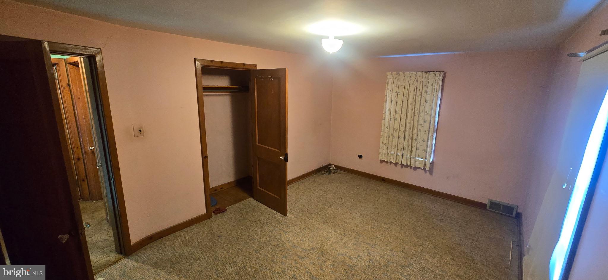 901 Garver Street Roaring Spring, PA 16673 - Photo 9 of 28 Cozy room with soft pink walls and light.