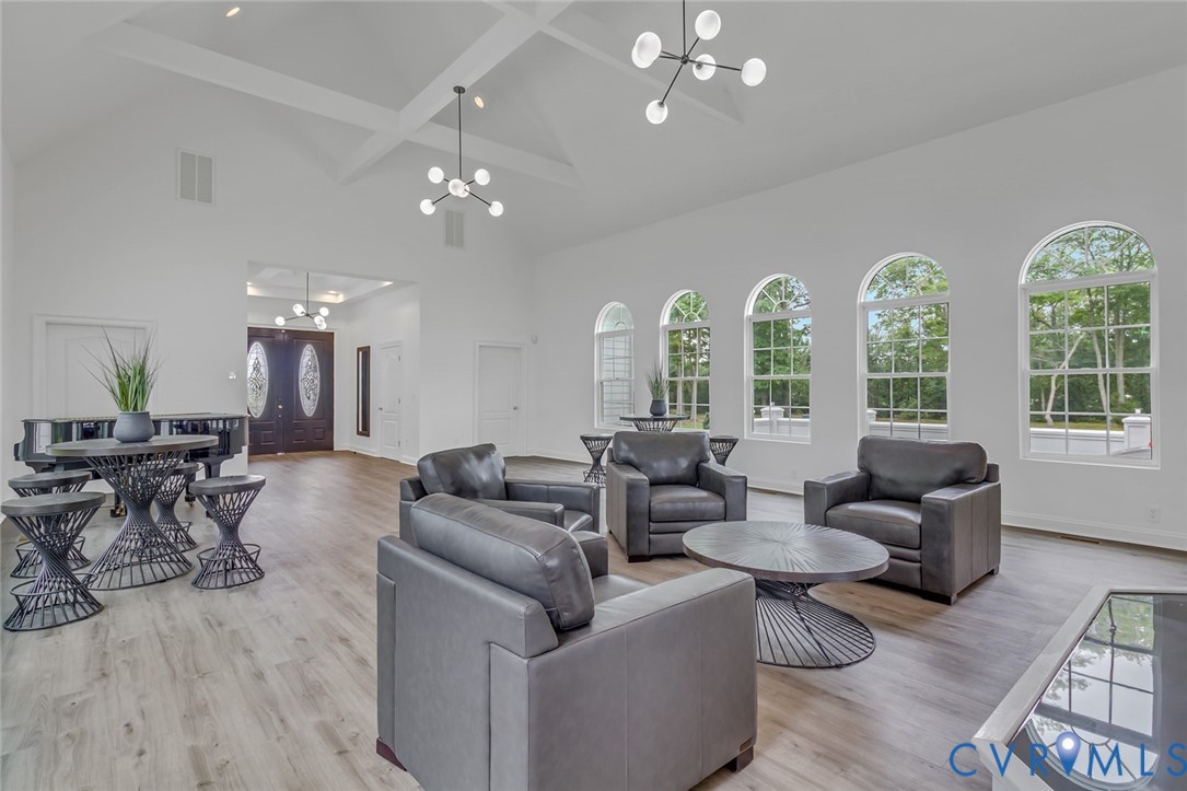 3315 Windmill Point Road White Stone, VA 22578 - Photo 16 of 49 a living room with furniture and a large window