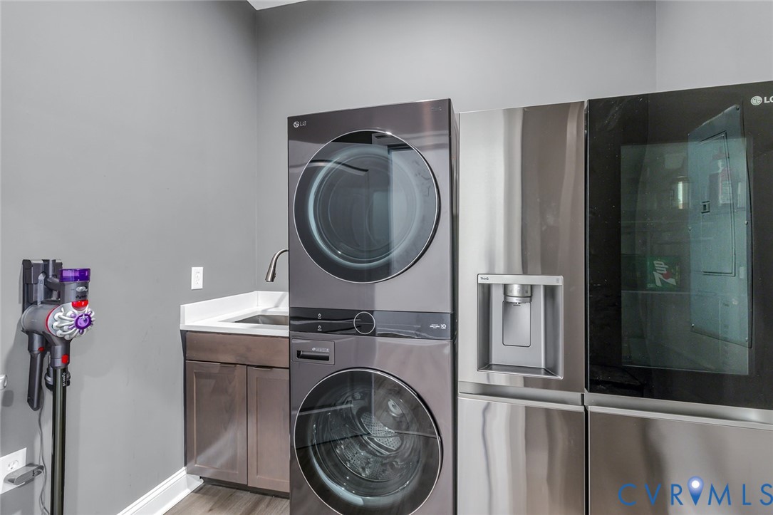 3315 Windmill Point Road White Stone, VA 22578 - Photo 23 of 49 a view of a hallway with washer and dryer