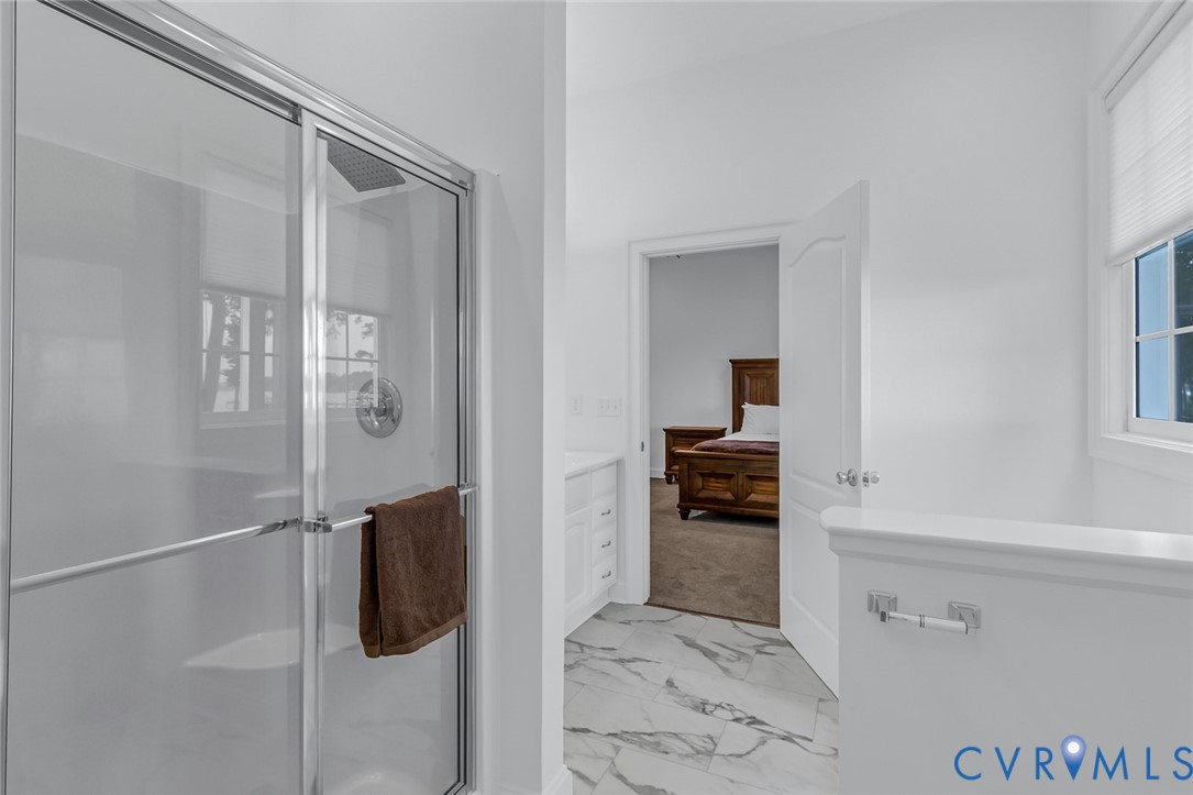 3315 Windmill Point Road White Stone, VA 22578 - Photo 27 of 49 a bathroom with a shower and a sink