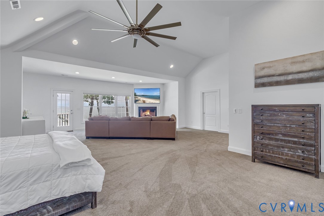 3315 Windmill Point Road White Stone, VA 22578 - Photo 30 of 49 a living room with furniture and a ceiling fan