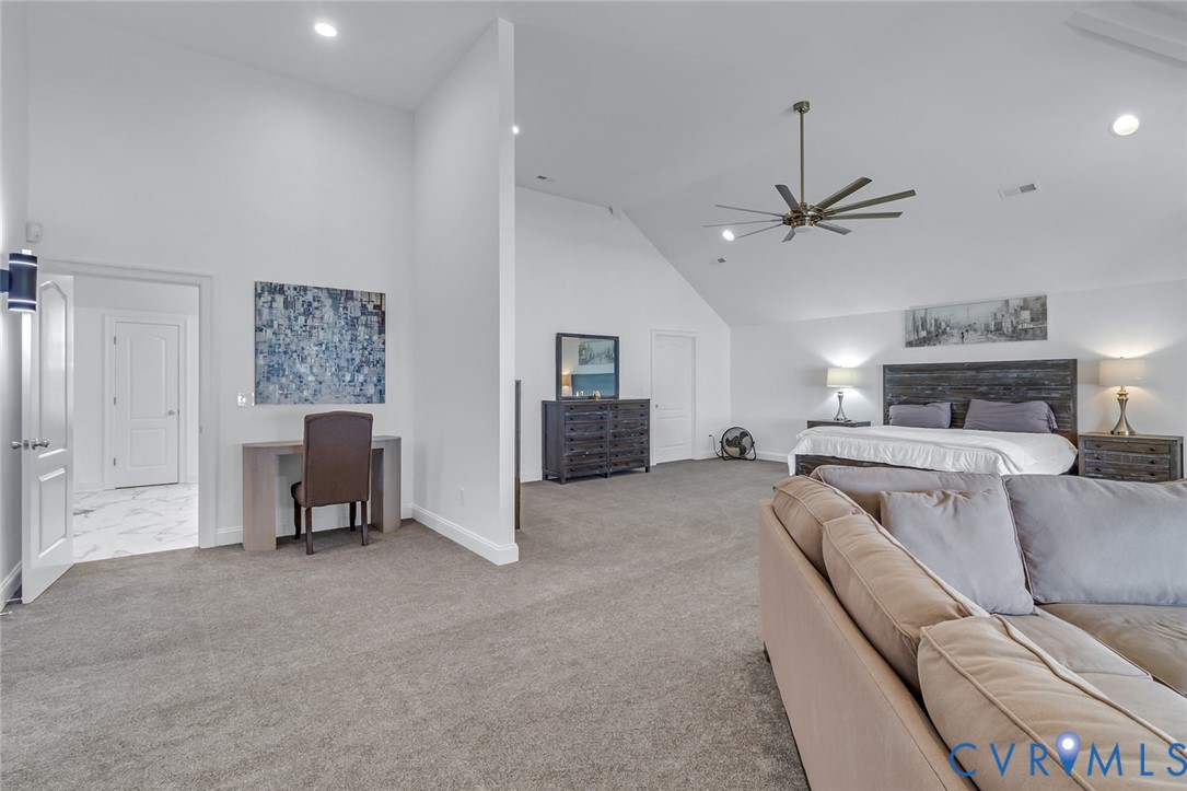 3315 Windmill Point Road White Stone, VA 22578 - Photo 32 of 49 a living room with furniture and a chandelier