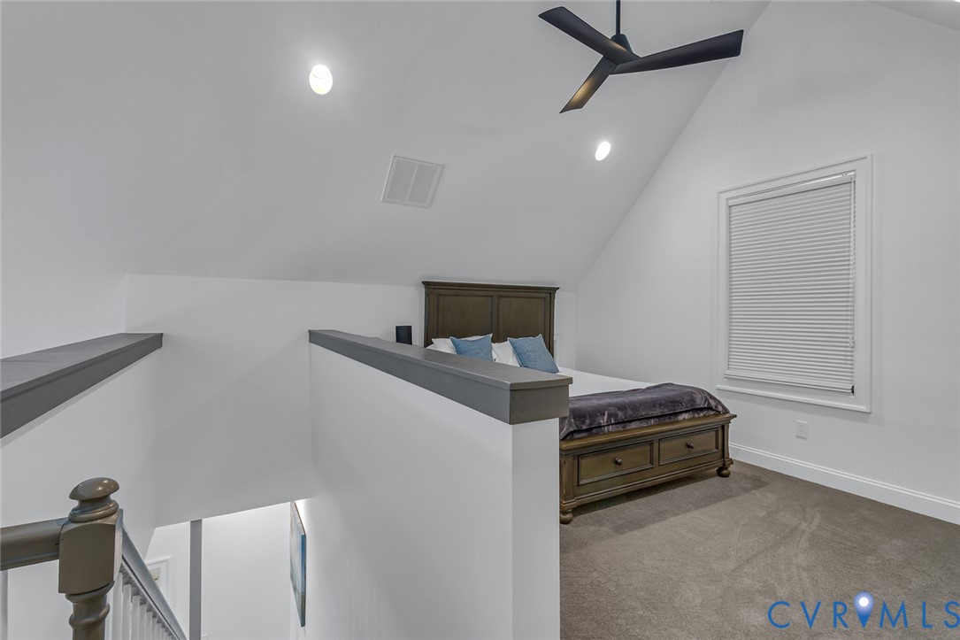 3315 Windmill Point Road White Stone, VA 22578 - Photo 40 of 49 a bedroom with a bed and a dresser