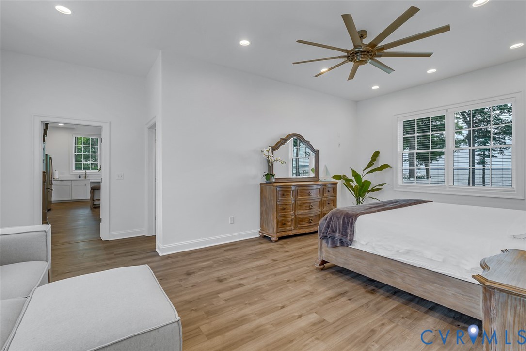 3315 Windmill Point Road White Stone, VA 22578 - Photo 41 of 49 a living room with a bed furniture and a window