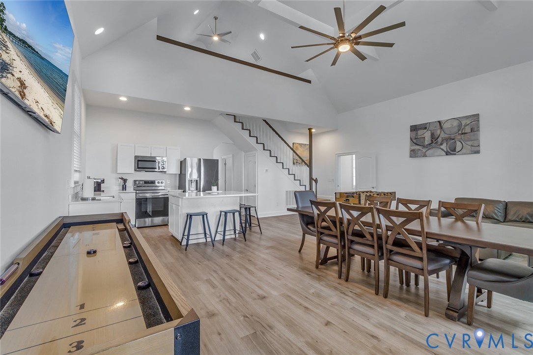 3315 Windmill Point Road White Stone, VA 22578 - Photo 45 of 49 a view of a dining room with furniture and wooden floor