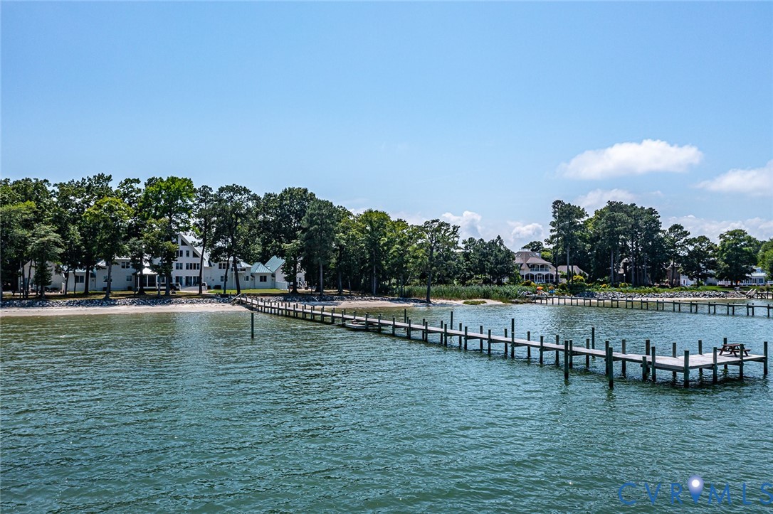 3315 Windmill Point Road White Stone, VA 22578 - Photo 6 of 49 a view of a lake with houses in the back