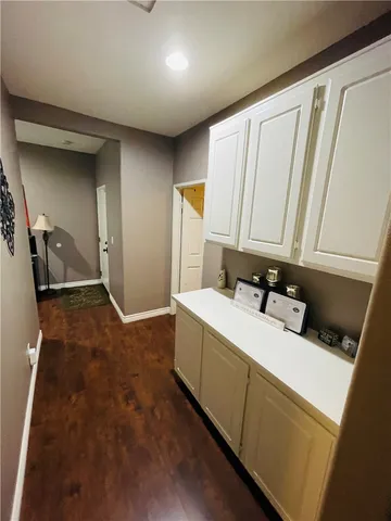 a workspace with furniture and window