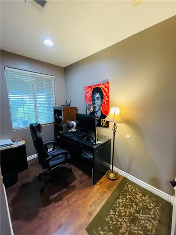 a bed room with furniture and a window