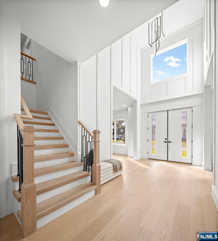 187 Brookfield Avenue Paramus, NJ 07652 - Photo 11 of 22 a view of an entryway with wooden floor and door