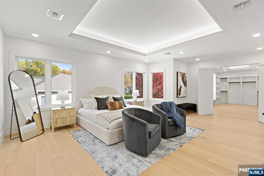 187 Brookfield Avenue Paramus, NJ 07652 - Photo 12 of 22 a living room with furniture a couch and large windows