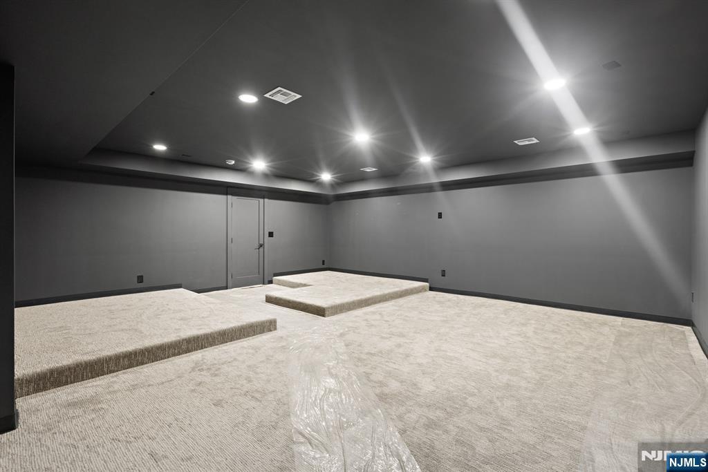 187 Brookfield Avenue Paramus, NJ 07652 - Photo 21 of 22 a large space with a bed