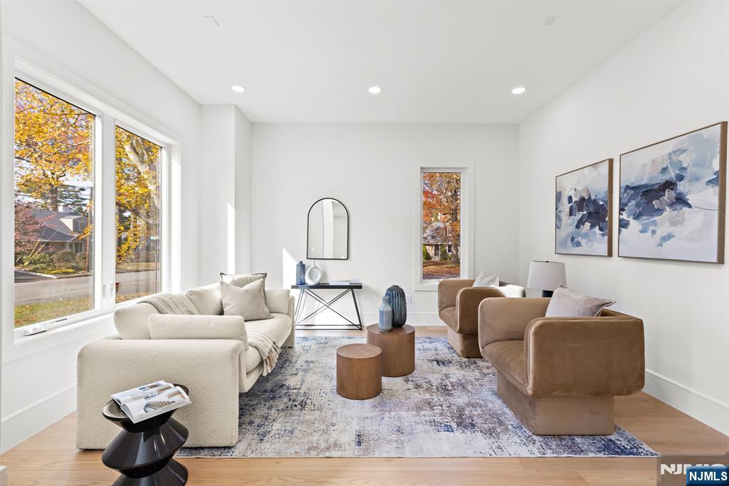 187 Brookfield Avenue Paramus, NJ 07652 - Photo 7 of 22 a living room with furniture and a large window