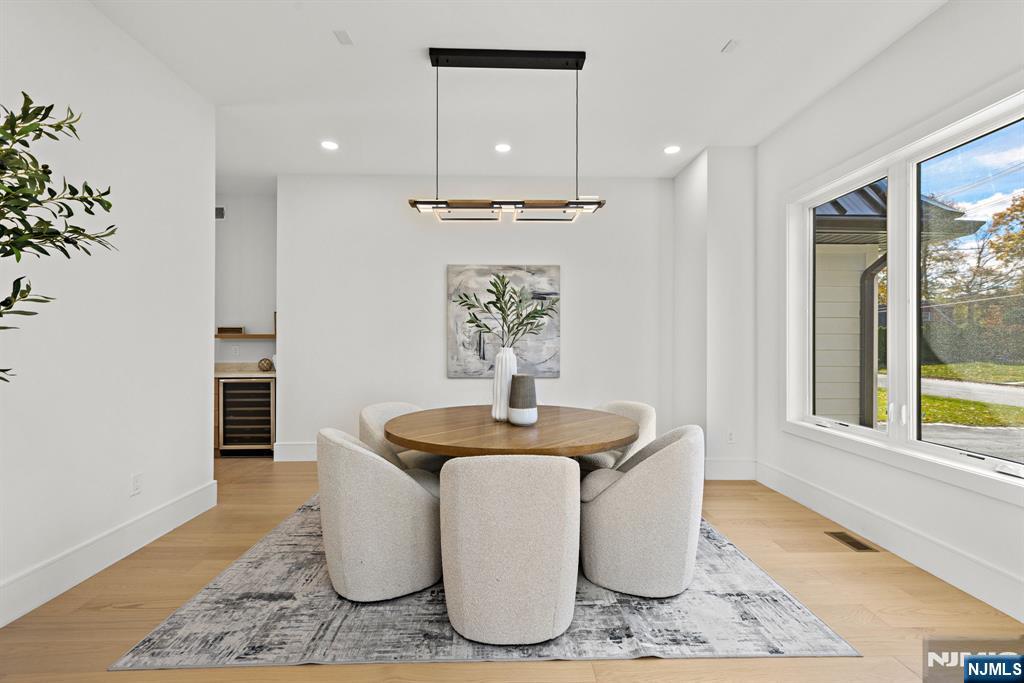 187 Brookfield Avenue Paramus, NJ 07652 - Photo 8 of 22 a room with table and window