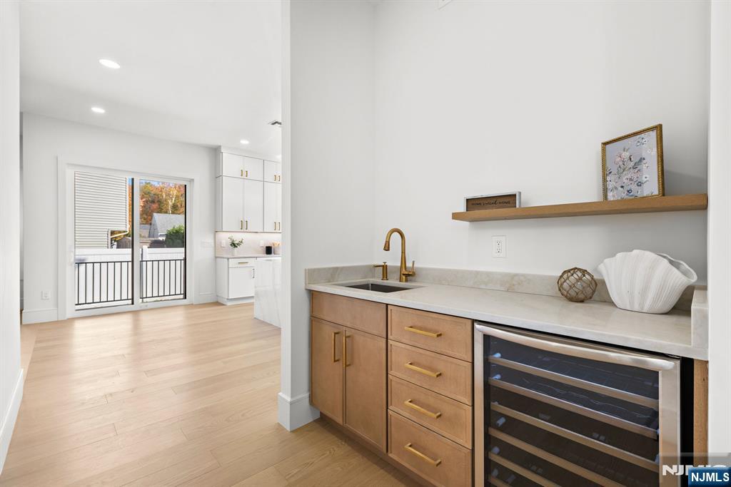 187 Brookfield Avenue Paramus, NJ 07652 - Photo 10 of 22 a spacious bathroom with a granite countertop sink and a mirror