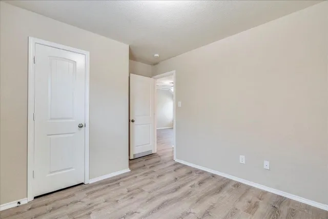 a bathroom with a sink toilet vanity and shower