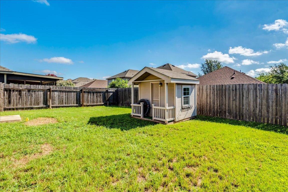 185 Housefinch Loop Leander, TX 78641 - Photo 30 of 39 a view of a house with a big yard plants and large trees