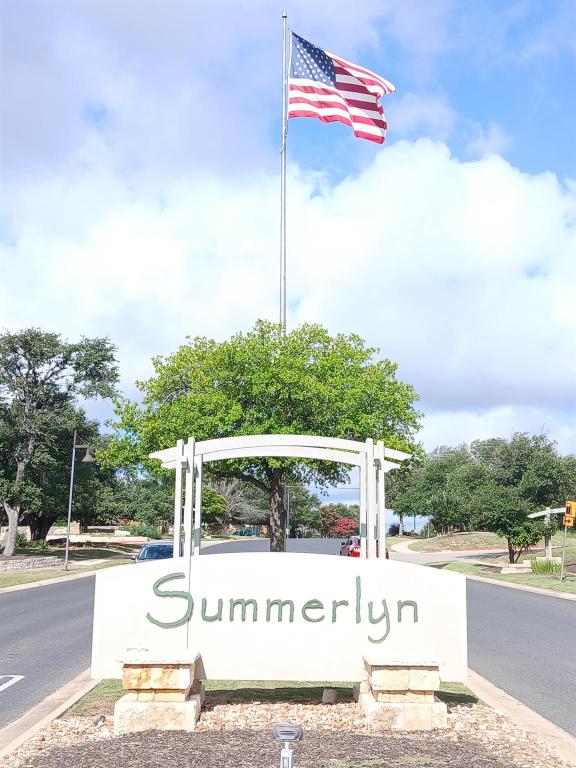 185 Housefinch Loop Leander, TX 78641 - Photo 34 of 39 a view of a street with a building in the background