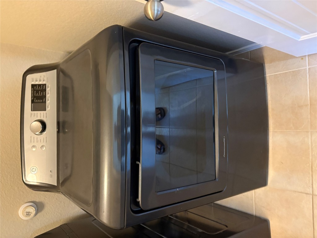 185 Housefinch Loop Leander, TX 78641 - Photo 39 of 39 a close view of washer and dryer