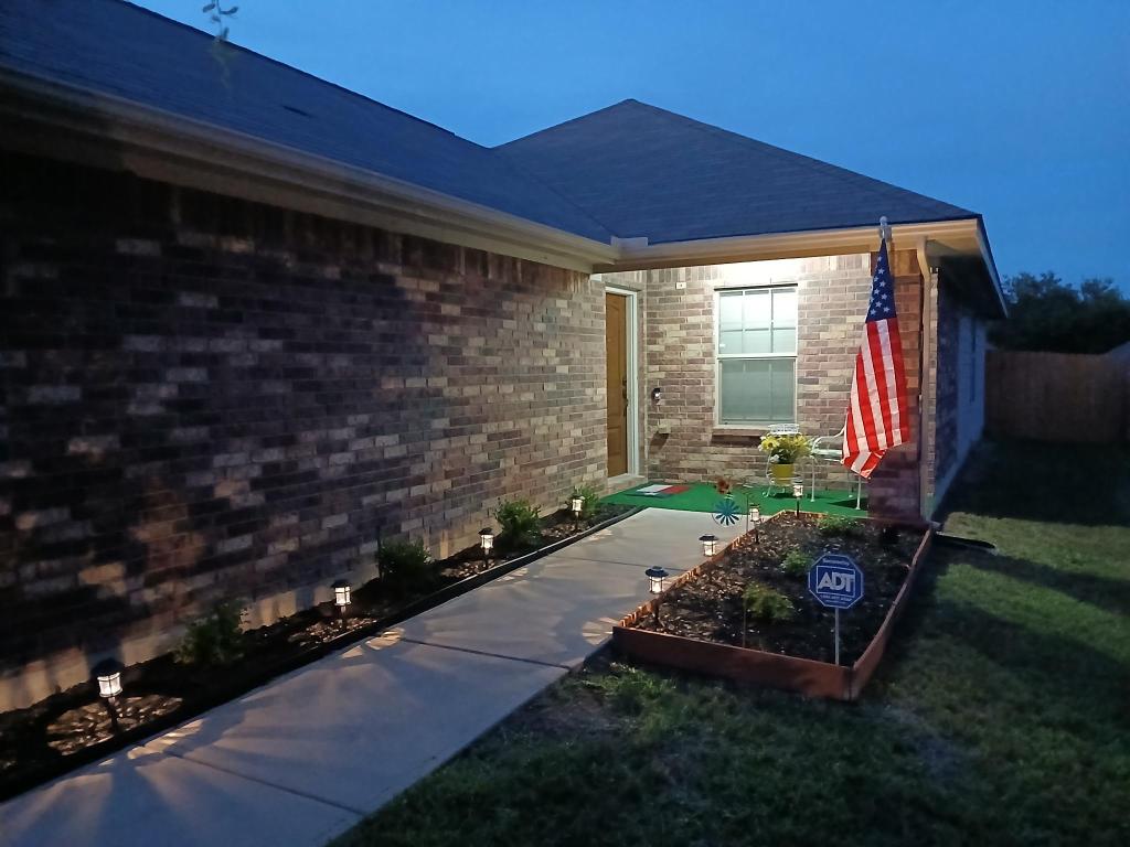 185 Housefinch Loop Leander, TX 78641 - Photo 6 of 39 a view of a backyard with plants