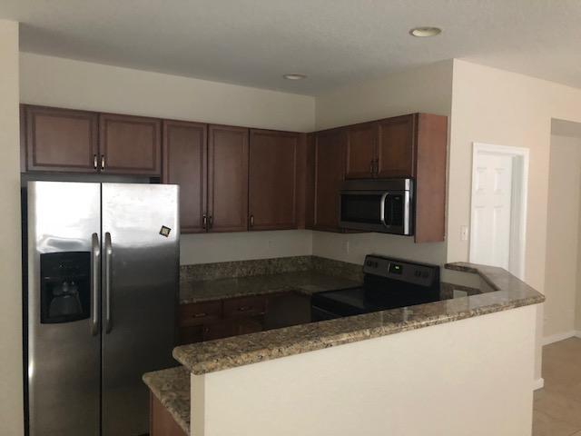 3029 Laurel Ridge Circle Riviera Beach, FL 33404 - Photo 7 of 20 IMG_1318