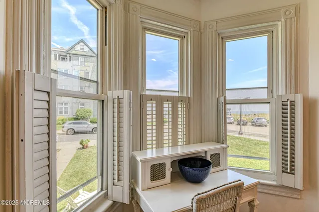 a view of a floor to ceiling window and a kitchen
