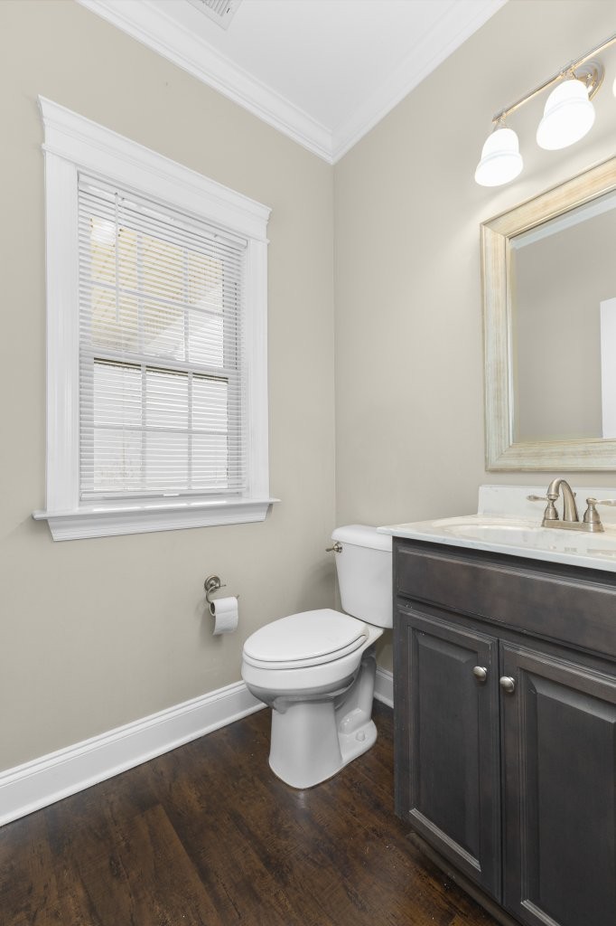 1752 John Lee Lane Murfreesboro, TN 37128 - Photo 23 of 39 a bathroom with a toilet a sink a window and mirror