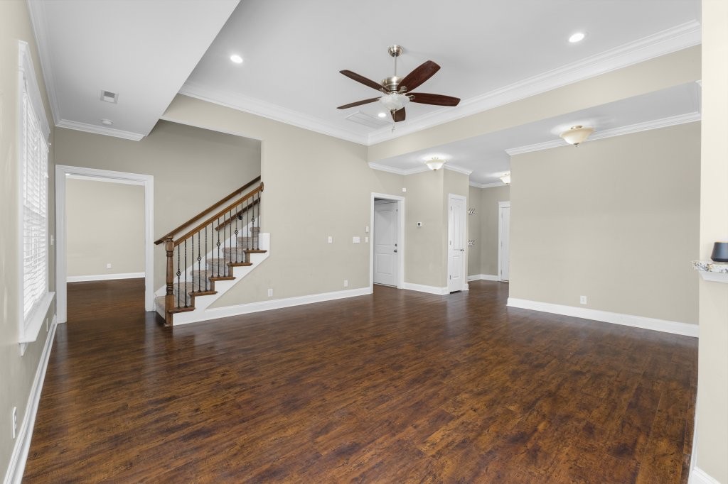 1752 John Lee Lane Murfreesboro, TN 37128 - Photo 36 of 39 a view of an empty room with wooden floor and a ceiling fan