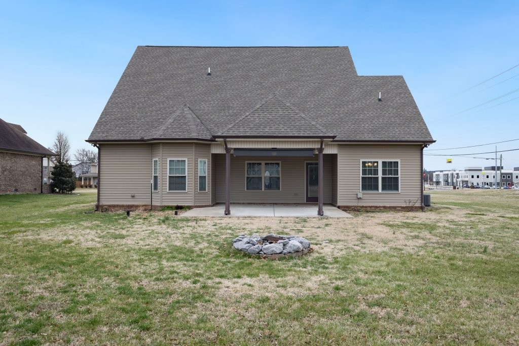 1752 John Lee Lane Murfreesboro, TN 37128 - Photo 5 of 39 front view of a house with a yard