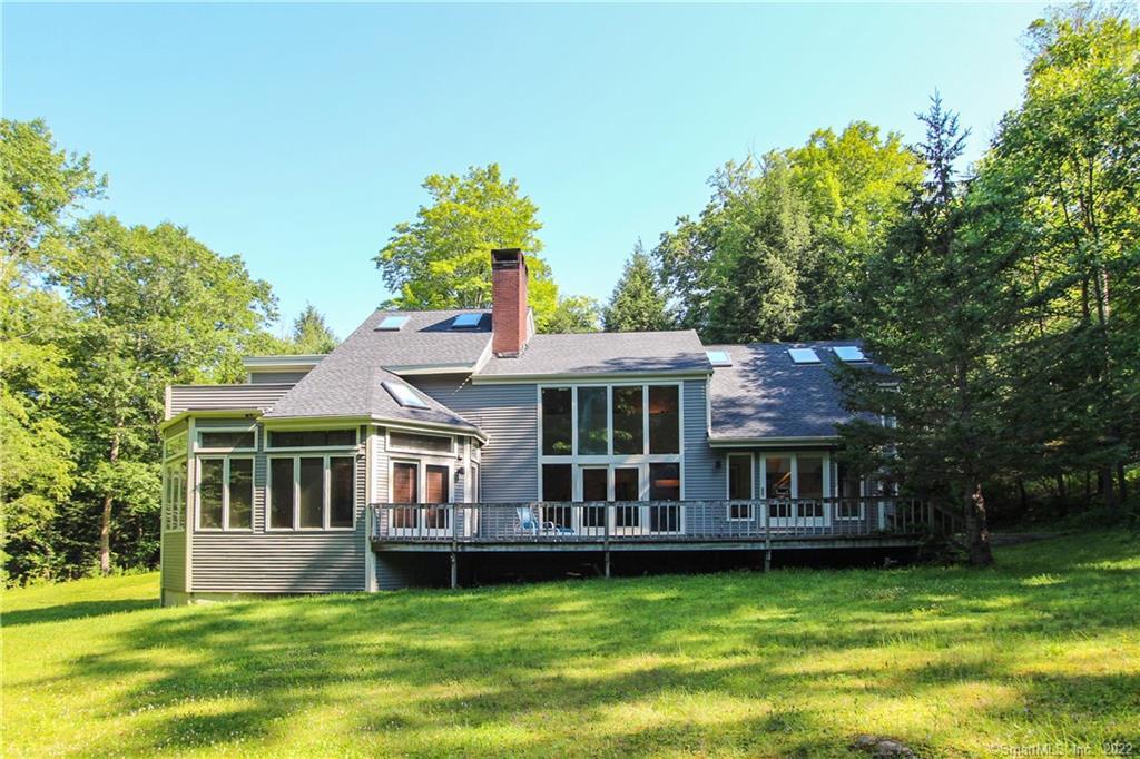 605 Milton Road Litchfield, CT 06759 - Photo 1 of 1 a view of a house with a swimming pool
