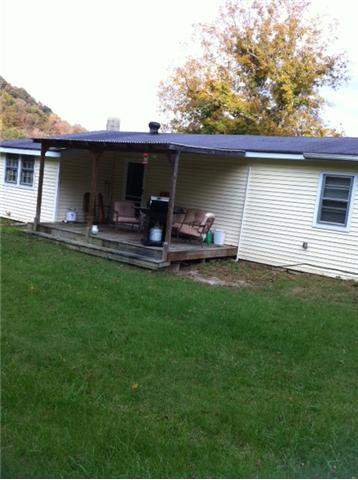 2058 Terrapin Branch Road Mount Pleasant, TN 38474 - Photo 14 of 20 Rear of Home showing back covered deck with Patio Furniture
