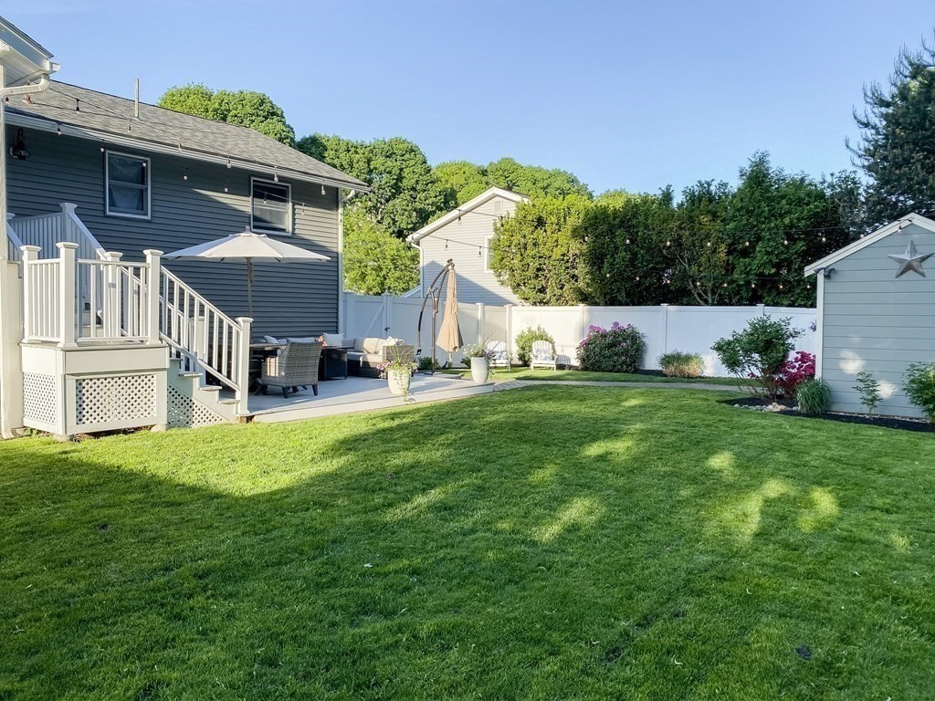 20 Crescent Drive Salem, MA 01970 - Photo 19 of 21 a view of backyard of house with green space