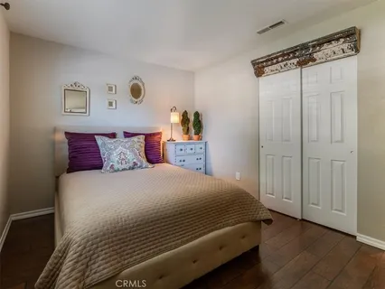 a bathroom with a bathtub and a mirror