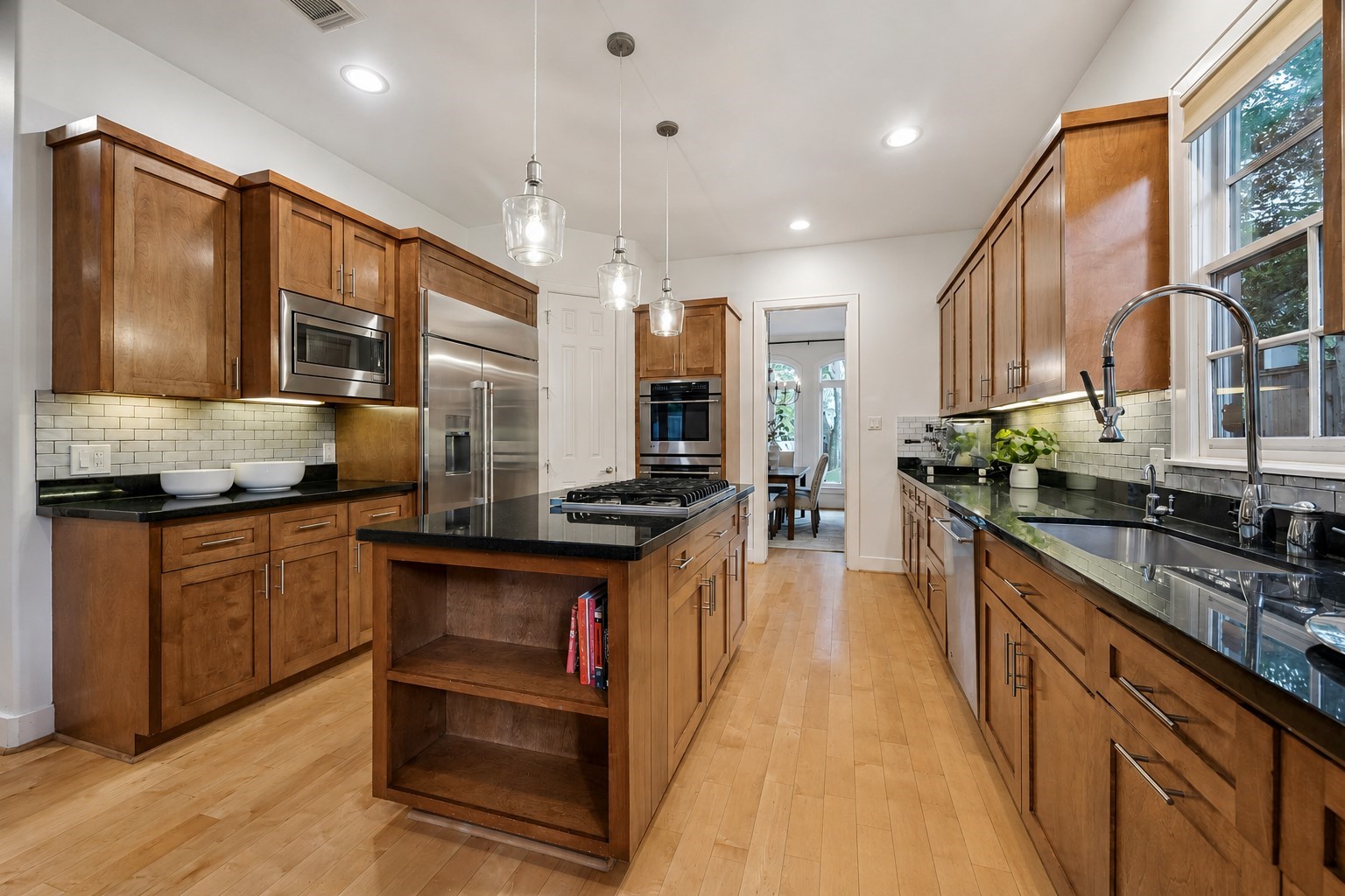 4010 Milton Street Houston, TX 77005 - Photo 9 of 49 Note the details. Viking Gas Cooktop, GE stainless steel appliances including a $12,000 fridge bought in 2022. Lots of cabinets and countertop space.