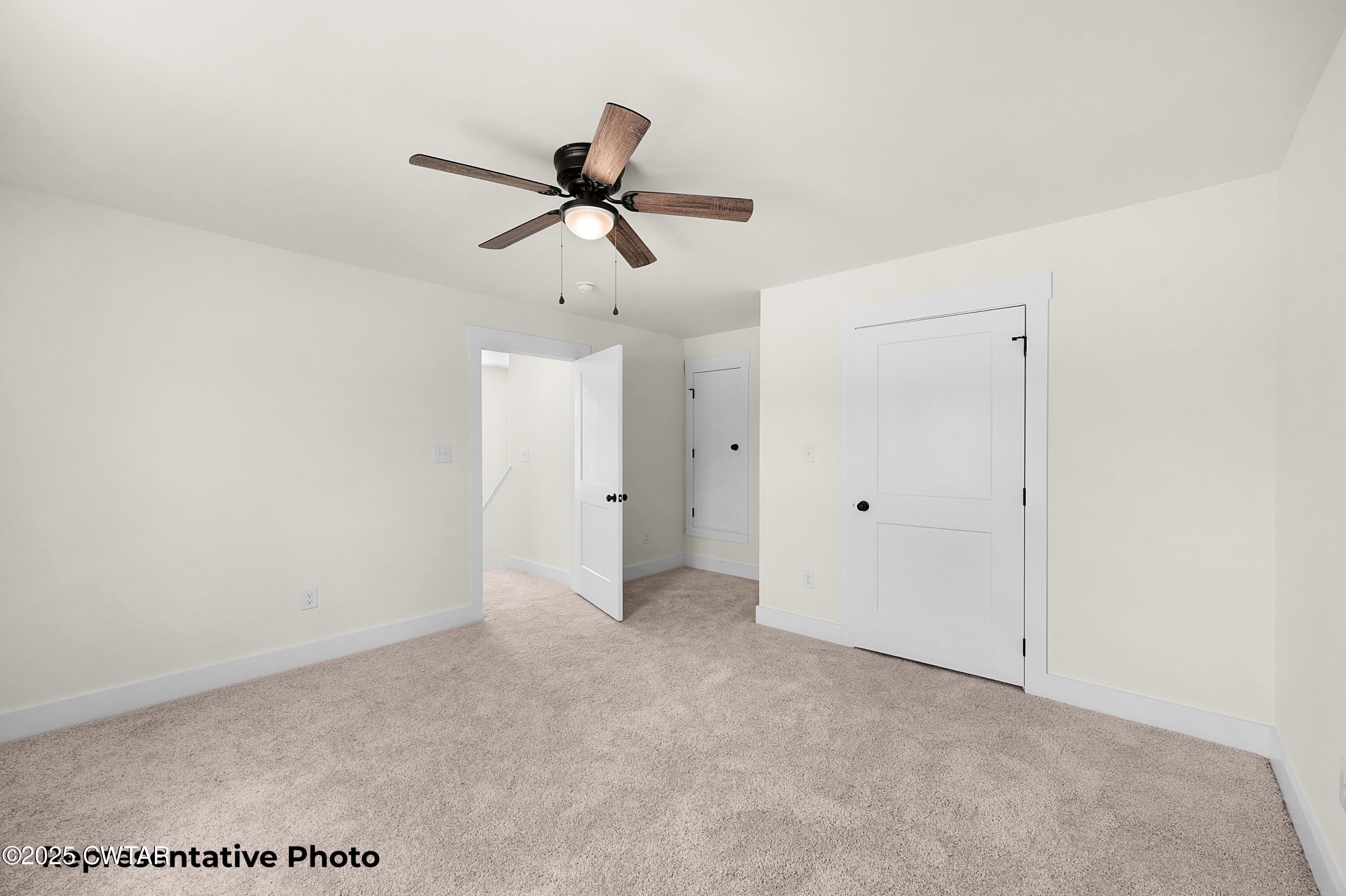 118 Roland Avenue Jackson, TN 38301 - Photo 18 of 24 a view of a room with a ceiling fan and window