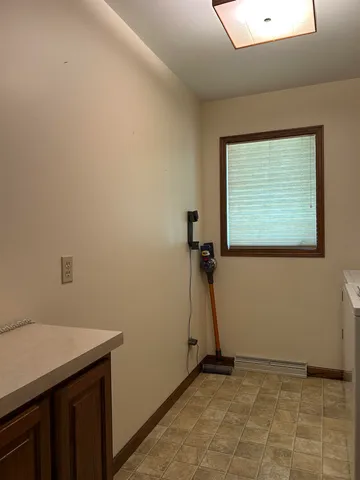 a view of a room with a window