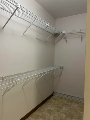 a view of a room with racks on the wall