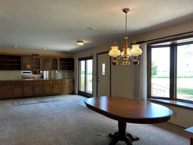 a view of a livingroom with furniture and window